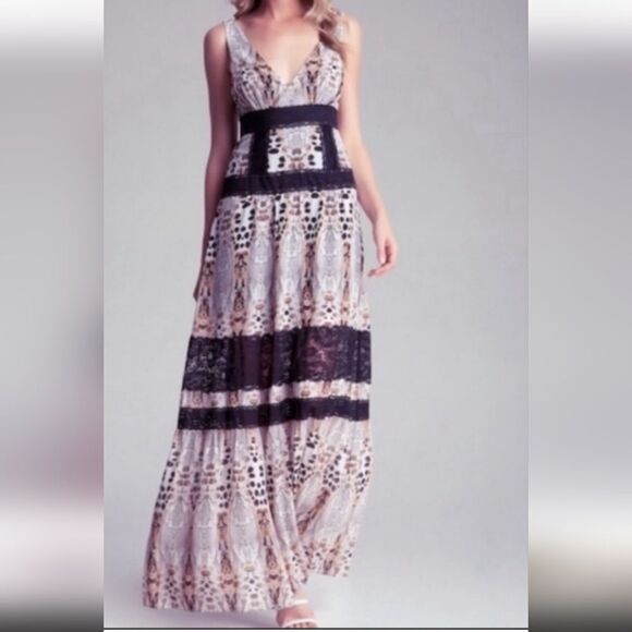 Stunning Bebe NWOT flowy maxi tired dress with lace details animal print… - Picture 1 of 16